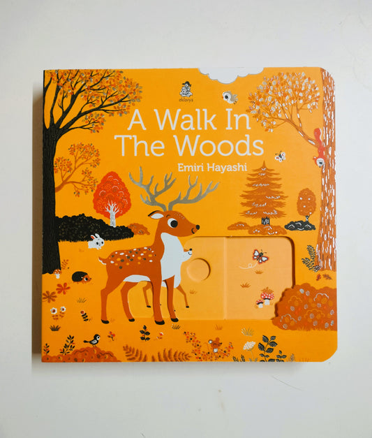 A Walk In The Woods (Sliding Board Book)